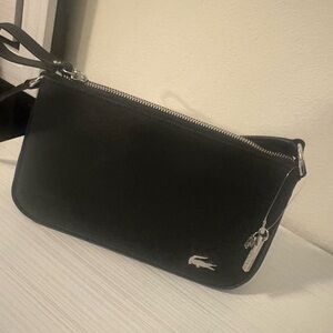 Lacoste Black Leather Wristlet with Silver Accents